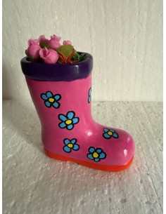 Botte en céramique et paquerettes