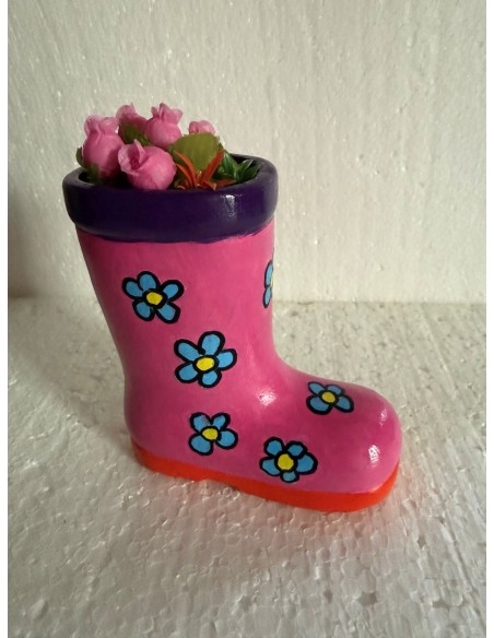 Botte en céramique et paquerettes